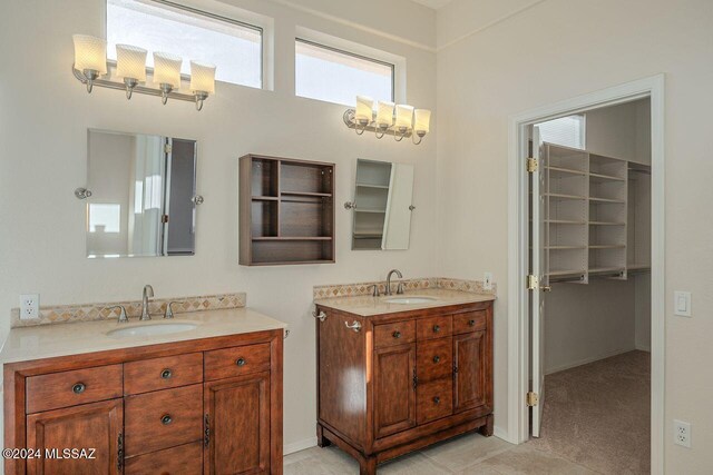 bathroom with tile patterned flooring and vanity