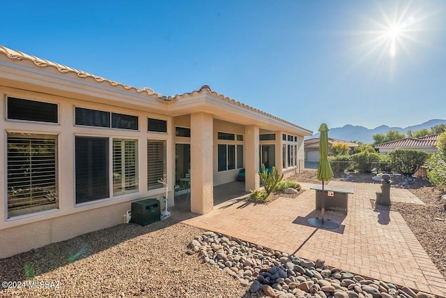 view of patio / terrace with a mountain view