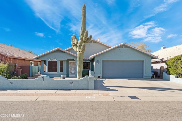 view of front of home with a garage