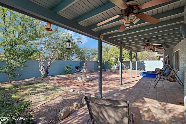 view of patio / terrace featuring ceiling fan