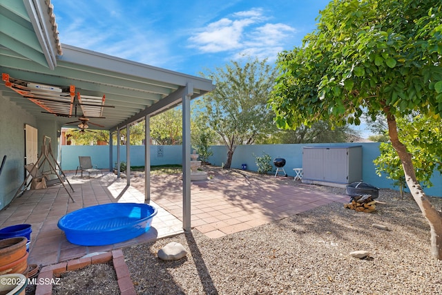 view of patio with ceiling fan