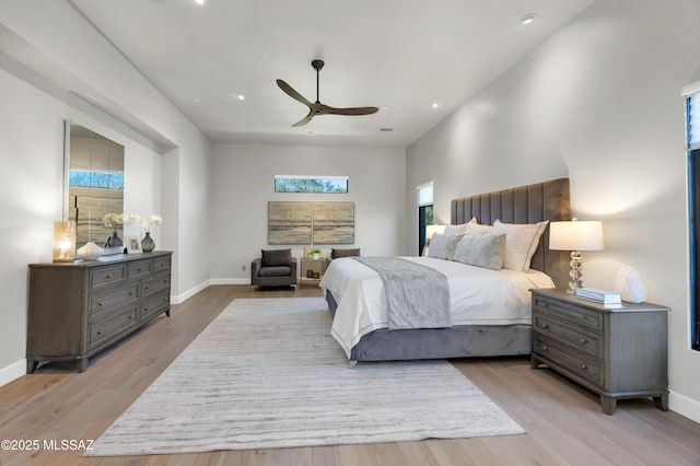 bedroom featuring ceiling fan and light wood-type flooring