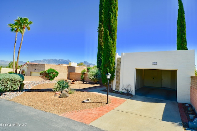 view of front of home with a mountain view