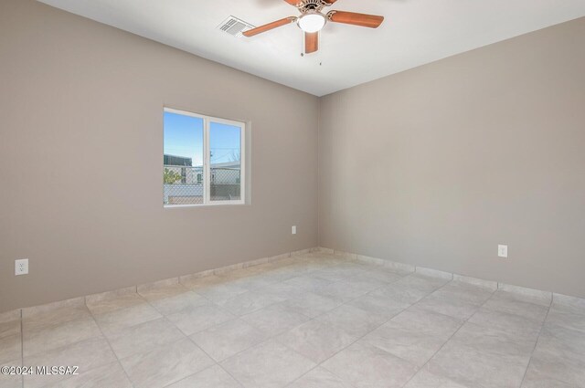 unfurnished dining area featuring light tile patterned flooring and sink