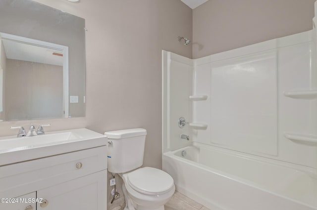 full bath featuring shower / bathing tub combination, vanity, and toilet