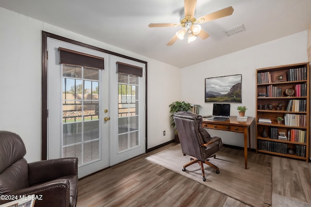 office space with french doors, hardwood / wood-style flooring, vaulted ceiling, and ceiling fan