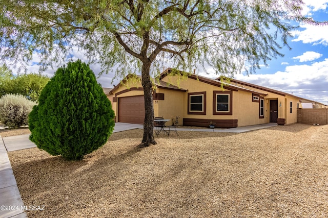 view of front of home with a garage