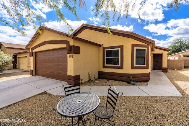 single story home with a garage