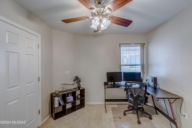 carpeted office with ceiling fan