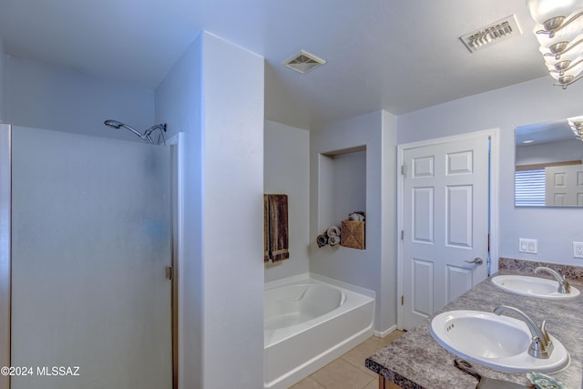 bathroom featuring separate shower and tub, tile patterned flooring, and vanity