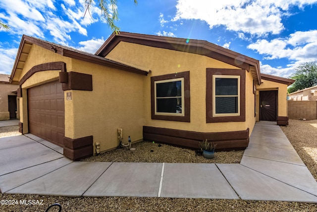 view of front of home with a garage