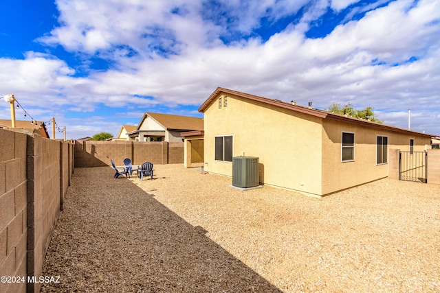 view of side of property featuring central AC unit