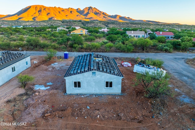 aerial view at dusk with a mountain view