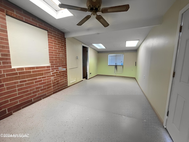 basement with brick wall