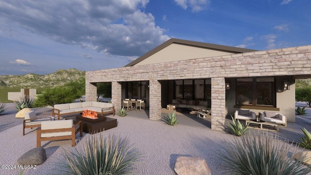 view of patio / terrace featuring an outdoor living space with a fire pit