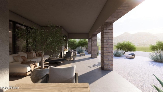 view of patio featuring a mountain view and outdoor lounge area