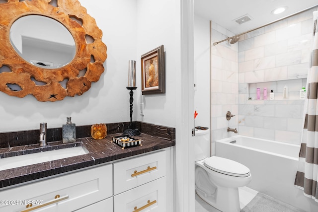 full bathroom featuring toilet, vanity, tile patterned floors, and shower / bathtub combination with curtain