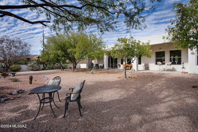 rear view of house with a patio area