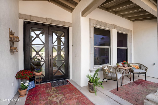 entrance to property with french doors