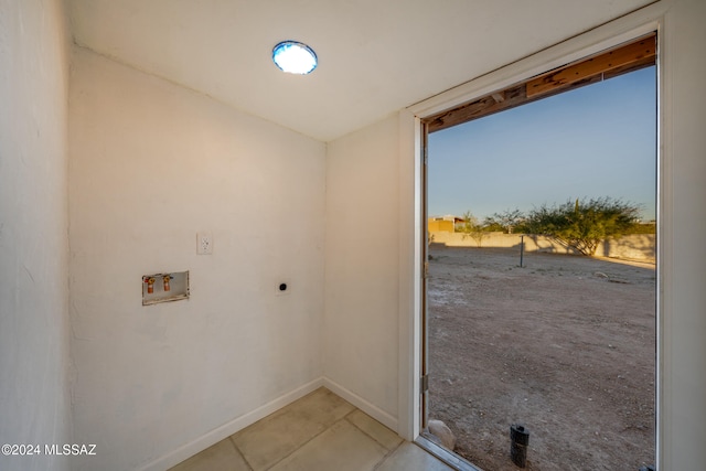 entryway featuring light carpet