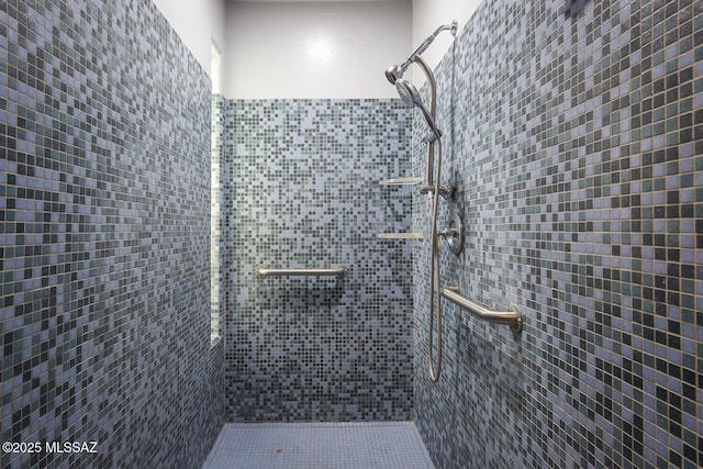 bathroom featuring a stall shower