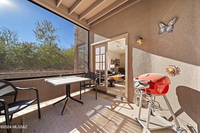 sunroom featuring french doors