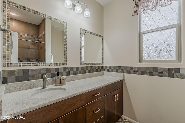 bathroom featuring tile walls and vanity