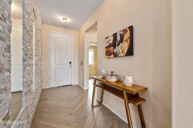 entrance foyer featuring baseboards