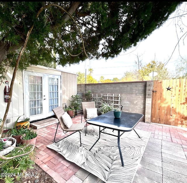 view of patio featuring french doors