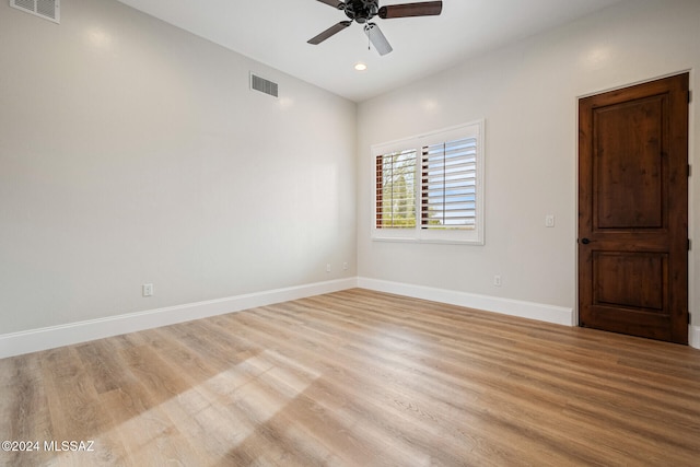 unfurnished room with light hardwood / wood-style floors and ceiling fan