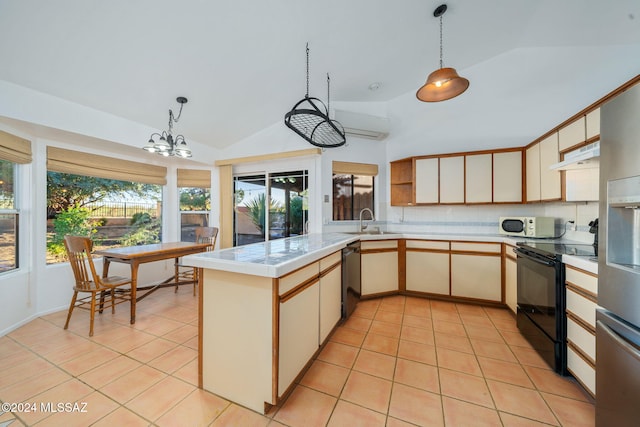 kitchen featuring kitchen peninsula, black / electric stove, vaulted ceiling, and hanging light fixtures