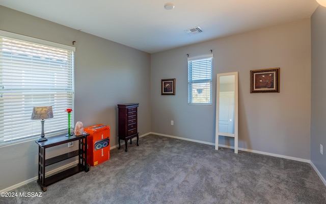 interior space featuring carpet