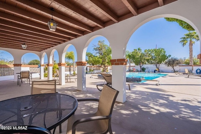 view of patio featuring a community pool