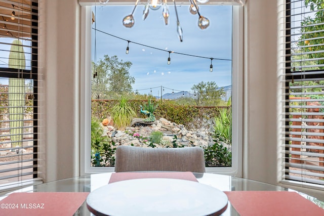 dining room featuring a chandelier