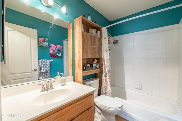 full bathroom featuring vanity, shower / bath combo, and toilet