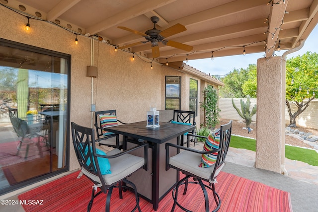 view of patio / terrace featuring ceiling fan