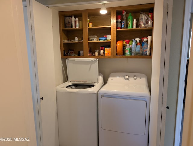 washroom with washer and clothes dryer