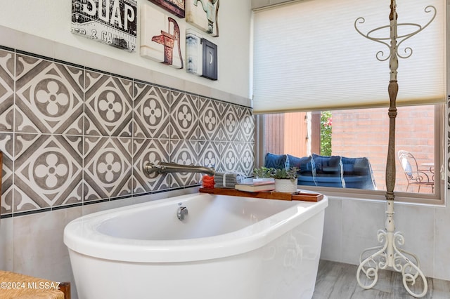 bathroom featuring a freestanding bath