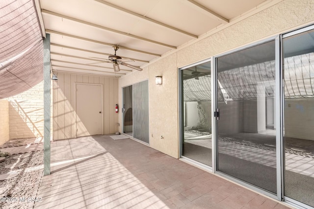 909 N Capron Pl, Tucson, AZ 85710 - unfurnished sunroom with a ceiling fan