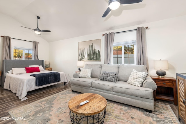 bedroom featuring hardwood / wood-style flooring, ceiling fan, and vaulted ceiling