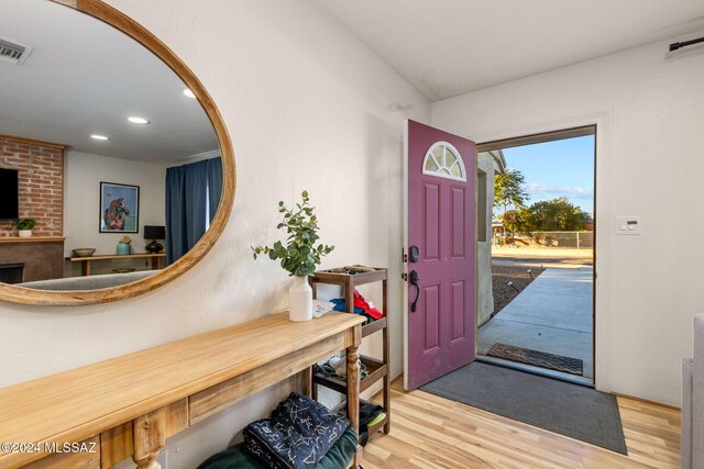 entrance foyer with light hardwood / wood-style flooring