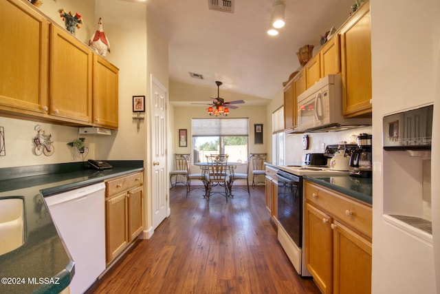 kitchen with lofted ceiling, ceiling fan, dark hardwood / wood-style floors, and white appliances