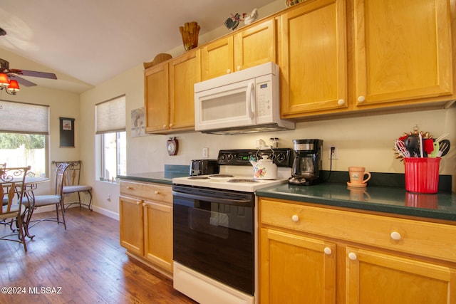 kitchen featuring dark hardwood / wood-style flooring, white appliances, ceiling fan, and lofted ceiling