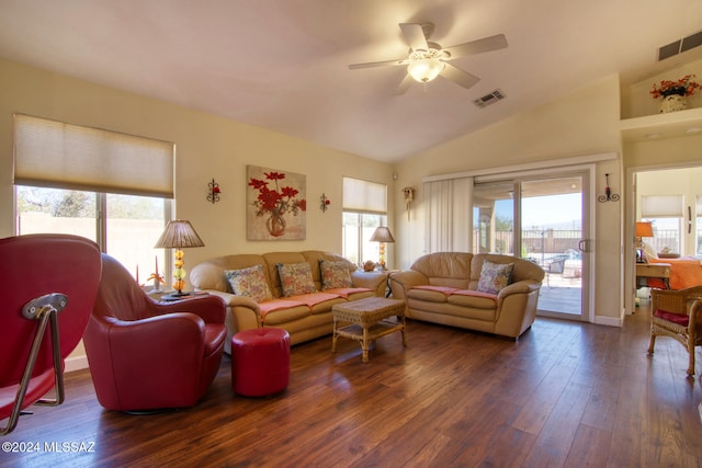 living room with ceiling fan, lofted ceiling, and dark wood-type flooring