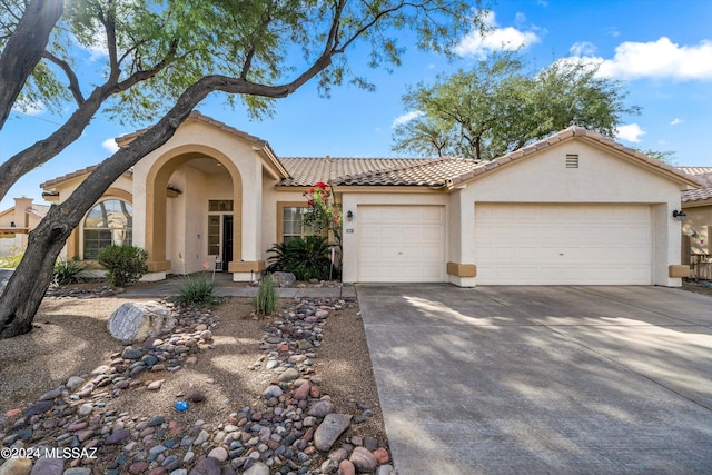 view of front of house with a garage