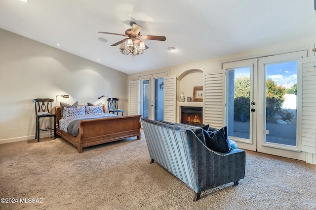 bedroom with carpet, ceiling fan, access to exterior, and french doors