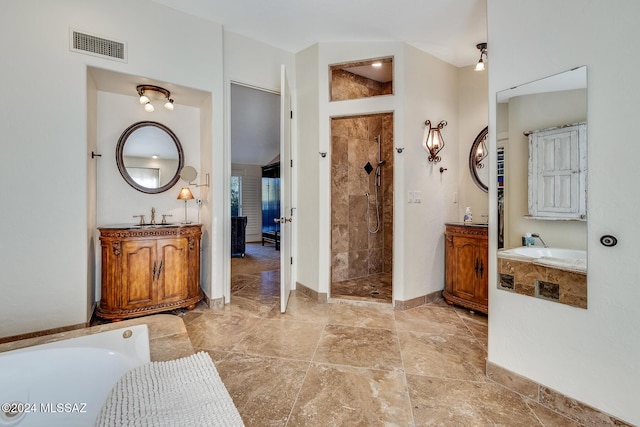 bathroom with plus walk in shower and vanity