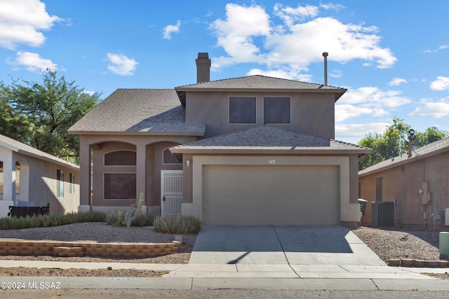 view of front of property with a garage