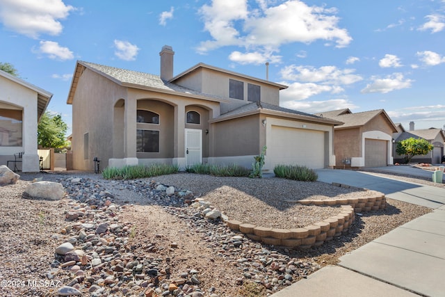 front facade with a garage