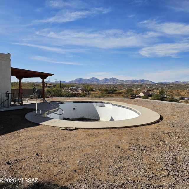 view of pool featuring a mountain view